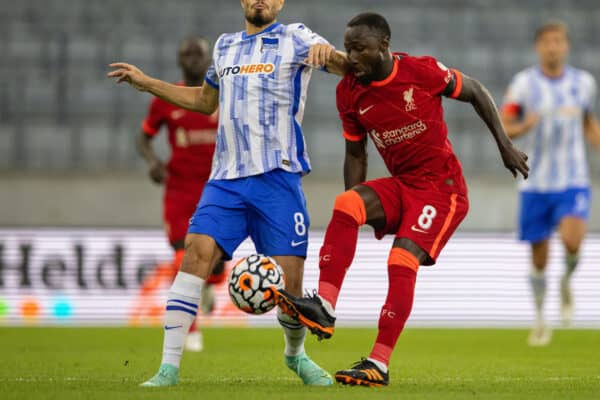 INNSBRUCK, AUSTRIA - Thursday, July 29, 2021: Liverpool's Naby Keita (R) is tackled by Hertha BSC’s Suat Serdar during a pre-season friendly match between Liverpool FC and Hertha BSC at the Tivoli Stadion. (Pic by Jürgen Faichter/Propaganda)