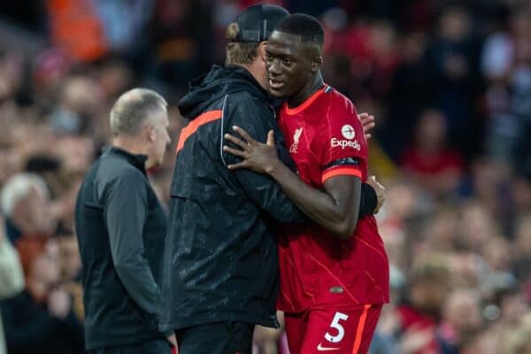 LIVERPOOL, ENGLAND - Monday, August 9, 2021: Liverpool's manager Jürgen Klopp embraces Ibrahima Konaté during a pre-season friendly match between Liverpool FC and Club Atlético Osasuna at Anfield. (Pic by David Rawcliffe/Propaganda)