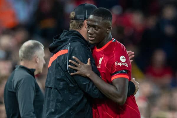 LIVERPOOL, ENGLAND - Monday, August 9, 2021: Liverpool's manager Jürgen Klopp embraces Ibrahima Konaté during a pre-season friendly match between Liverpool FC and Club Atlético Osasuna at Anfield. (Pic by David Rawcliffe/Propaganda)