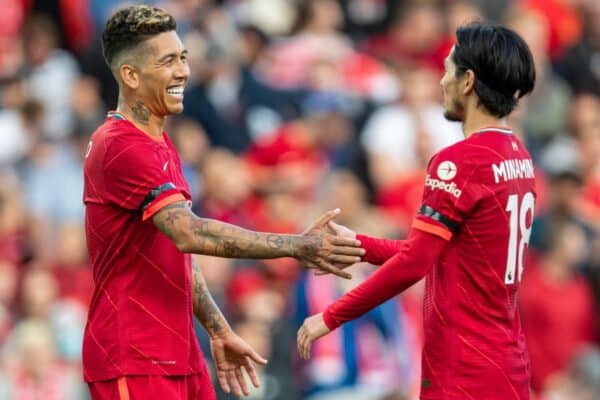 LIVERPOOL, ENGLAND - Monday, August 9, 2021: Liverpool's Roberto Firmino (L) celebrates after scoring the third goal, his second, with team-mate Takumi Minamino during a pre-season friendly match between Liverpool FC and Club Atlético Osasuna at Anfield. (Pic by David Rawcliffe/Propaganda)