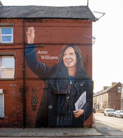 LIVERPOOL, ENGLAND - Friday, August 20, 2021: A street art mural of Hillsbrough justice campaigner Anne Williams, painted on the side of a building in Anfield only a few streets away from Liverpool Football Club's Anfield stadium. (Pic by David Rawcliffe/Propaganda)