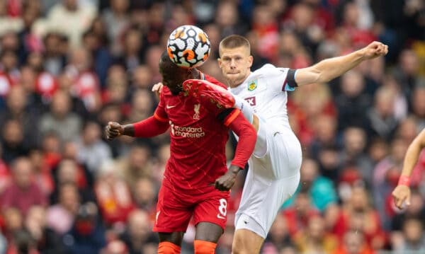 LIVERPOOL, ENGLAND - Saturday, August 21, 2021: Liverpool's Naby Keita is kicked in the head by Burnley's Josh Brownhill during the FA Premier League match between Liverpool FC and Burnley FC at Anfield. (Pic by David Rawcliffe/Propaganda)