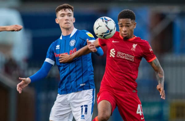 ROCHDALE, ENGLAND - Tuesday, August 31, 2021: Liverpool's Elijah Dixon-Bonner (R) and Rochdale's Conor Grant during the English Football League Trophy match between Rochdale AFC and Liverpool FC Under-21's at Spotland Stadium. (Pic by David Rawcliffe/Propaganda)