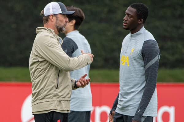 LIVERPOOL, ENGLAND - Tuesday, September 14, 2021: Liverpool's manager Jürgen Klopp (L) chats with Ibrahima Konaté during a training session at the AXA Training Centre ahead of the UEFA Champions League Group B Matchday 1 game between Liverpool FC and AC MIlan. (Pic by David Rawcliffe/Propaganda)