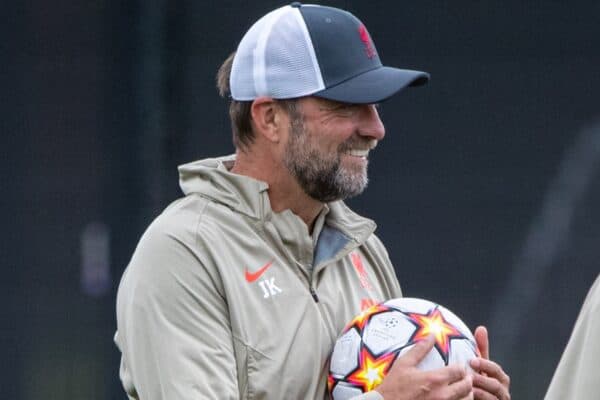 LIVERPOOL, ENGLAND - Tuesday, September 14, 2021: Liverpool's manager Jürgen Klopp checks out the new balls during a training session at the AXA Training Centre ahead of the UEFA Champions League Group B Matchday 1 game between Liverpool FC and AC MIlan. (Pic by David Rawcliffe/Propaganda)