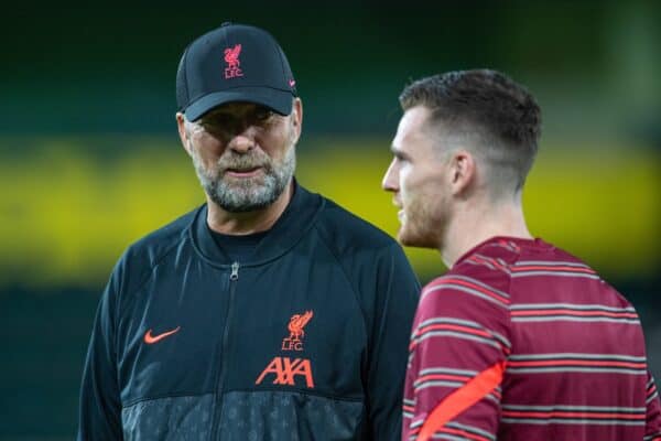 NORWICH, ENGLAND - Tuesday, September 21, 2021: Liverpool's manager Jürgen Klopp chats with Andy Robertson (R) during the pre-match warm-up before the Football League Cup 3rd Round match between Norwich City FC and Liverpool FC at Carrow Road. (Pic by David Rawcliffe/Propaganda)