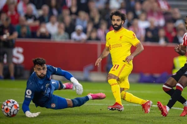 LONDON, ENGLAND - Saturday, September 25, 2021: Liverpool's Mohamed Salah scores the second goal past Brentford's goalkeeper David Raya during the FA Premier League match between Brentford FC and Liverpool FC at the Brentford Community Stadium. (Pic by David Rawcliffe/Propaganda)