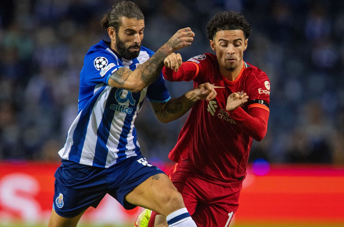 PORTO, PORTUGAL - Tuesday, September 28, 2021: Liverpool's Curtis Jones (R) FC Porto's Se?rgio Oliveira during the UEFA Champions League Group B Matchday 2 game between FC Porto and Liverpool FC at the Estádio do Dragão. (Pic by David Rawcliffe/Propaganda)