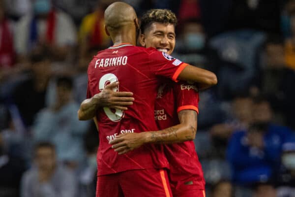 PORTO, PORTUGAL - Tuesday, September 28, 2021: Liverpool's Roberto Firmino celebrates after scoring the fifth goal, his second of the game, with team-mate Fabio Henrique Tavares 'Fabinho' (L) during the UEFA Champions League Group B Matchday 2 game between FC Porto and Liverpool FC at the Estádio do Dragão. (Pic by David Rawcliffe/Propaganda)