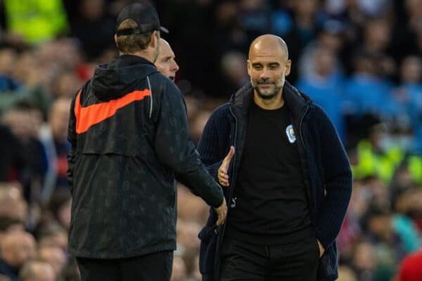 LIVERPOOL, ENGLAND - Sunday, October 3, 2021: Manchester City's manager Josep 'Pep' Guardiola shakes hands with Liverpool's manager Jürgen Klopp during the FA Premier League match between Liverpool FC and Manchester City FC at Anfield. (Pic by David Rawcliffe/Propaganda)