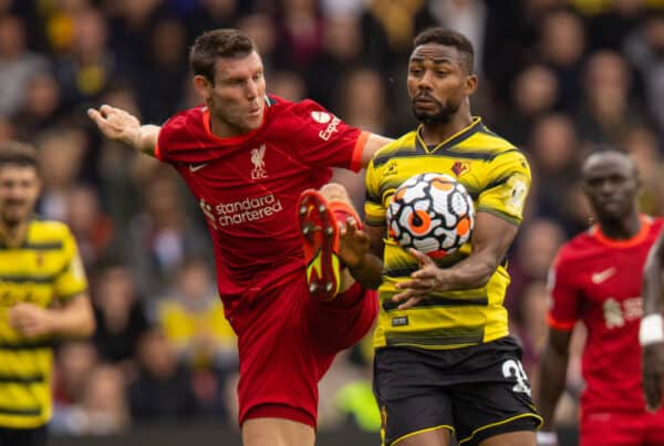 WATFORDF, ENGLAND - Saturday, October 16, 2021: Liverpool's James Milner (L) and Watford's Emmanuel Dennis during the FA Premier League match between Watford FC and Liverpool FC at Vicarage Road. (Pic by David Rawcliffe/Propaganda)