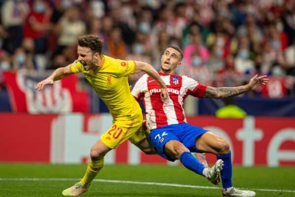 MADRID, SPAIN - Tuesday, October 19, 2021: Liverpool's Diogo Jota (L) is fouled by Club Atlético de Madrid's Mario Hermoso fpr a penalty during the UEFA Champions League Group B Matchday 3 game between Club Atlético de Madrid and Liverpool FC at the Estadio Metropolitano. (Pic by David Rawcliffe/Propaganda)