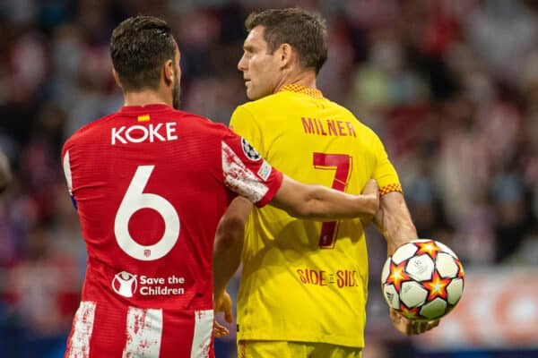 MADRID, SPAIN - Tuesday, October 19, 2021: Liverpool's James Milner (R) hides the ball from Club Atlético de Madrid's captain Jorge Resurrección Merodio 'Koke' during the UEFA Champions League Group B Matchday 3 game between Club Atlético de Madrid and Liverpool FC at the Estadio Metropolitano. (Pic by David Rawcliffe/Propaganda)