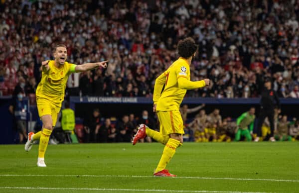 MADRID, SPAIN - Tuesday, October 19, 2021: Liverpool's captain Jordan Henderson (L) celebrates after Mohamed Salah (R) scored the opening goal during the UEFA Champions League Group B Matchday 3 game between Club Atlético de Madrid and Liverpool FC at the Estadio Metropolitano. (Pic by David Rawcliffe/Propaganda)