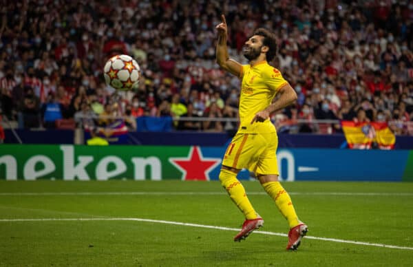 MADRID, SPAIN - Tuesday, October 19, 2021: Liverpool's Mohamed Salah celebrates after scoring the third goal, from a penalty-kick, to makes the score 2-3 during the UEFA Champions League Group B Matchday 3 game between Club Atlético de Madrid and Liverpool FC at the Estadio Metropolitano. (Pic by David Rawcliffe/Propaganda)