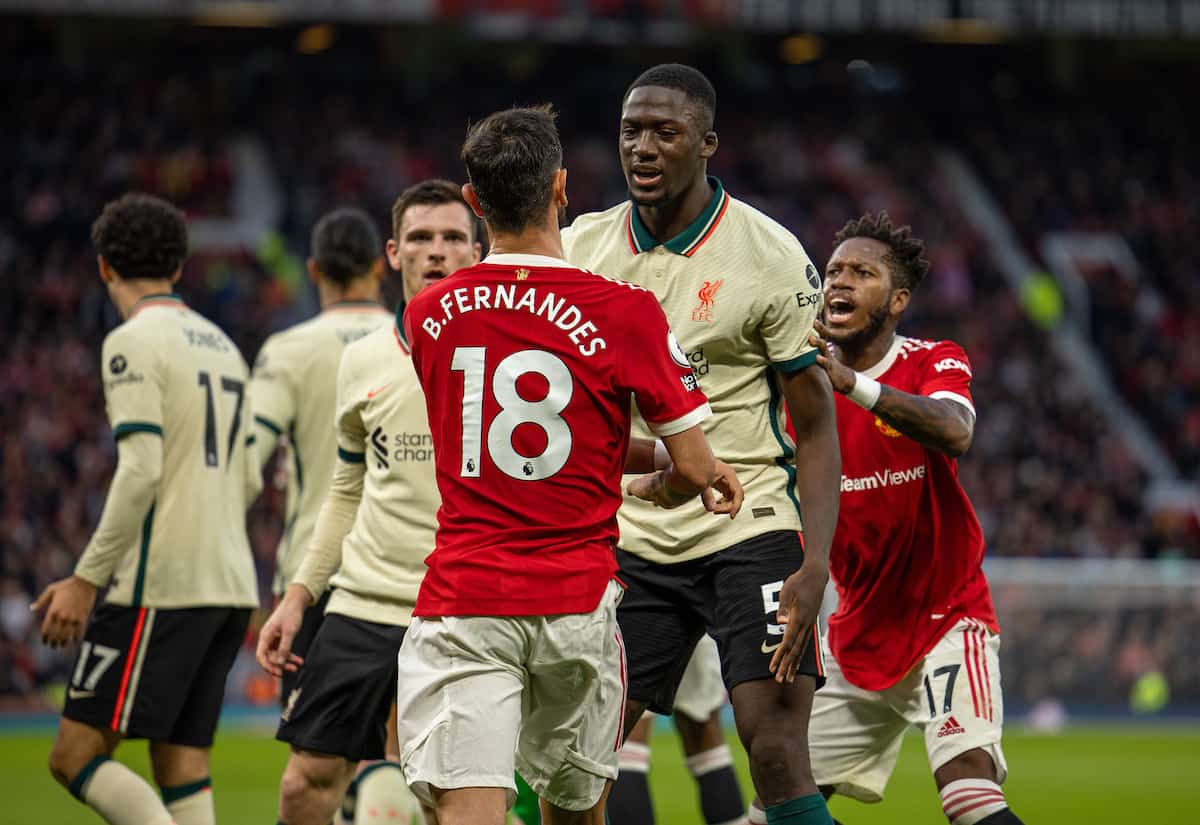 MANCHESTER, ENGLAND - Sunday, October 24, 2021: Liverpool's Ibrahima Konaté and Manchester United's Bruno Fernandes clash during the FA Premier League match between Manchester United FC and Liverpool FC at Old Trafford. (Pic by David Rawcliffe/Propaganda)