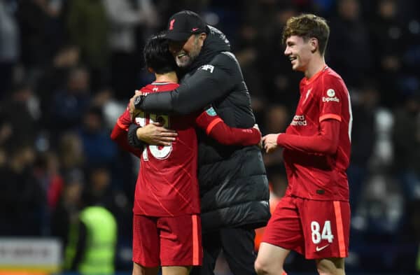 PRESTON, ENGLAND - Wednesday, October 27, 2021: Liverpool's manager Jürgen Klopp embraces goal-scorer Takumi Minamino after the English Football League Cup 4th Round match between Preston North End FC and Liverpool FC at Deepdale. (Pic by David Rawcliffe/Propaganda)