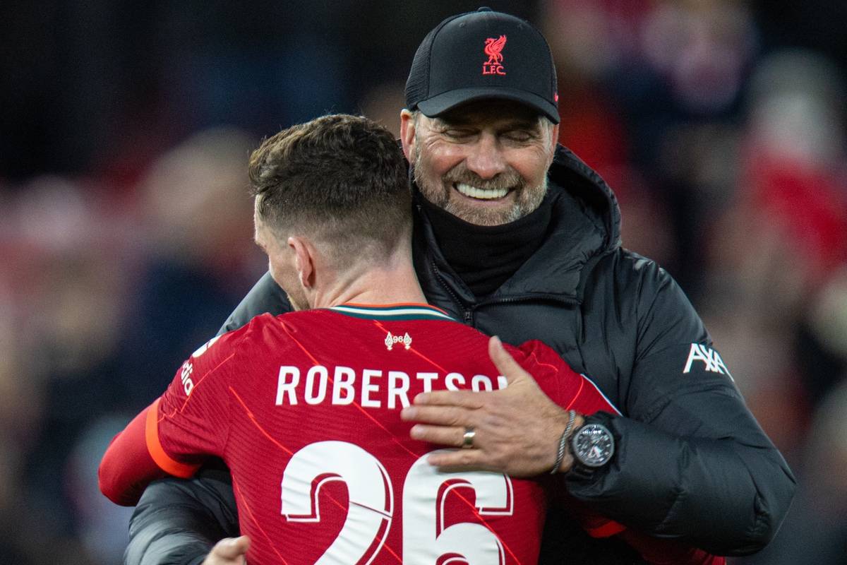 LIVERPOOL, ENGLAND - Wednesday, November 24, 2021: Liverpool's manager Jürgen Klopp (R) embraces Andy Robertson after the UEFA Champions League Group B Matchday 5 game between Liverpool FC and FC Porto at Anfield. (Pic by David Rawcliffe/Propaganda)