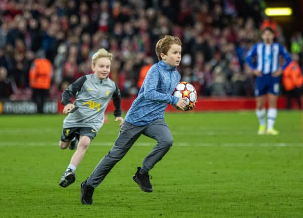 LIVERPOOL, ENGLAND - Wednesday, November 24, 2021: A young supporter runs onto the pitch to grab the match ball after during the UEFA Champions League Group B Matchday 5 game between Liverpool FC and FC Porto at Anfield. (Pic by David Rawcliffe/Propaganda)