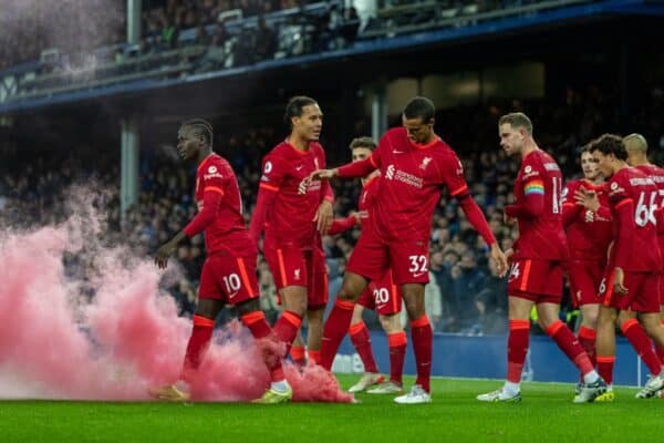 LIVERPOOL, ENGLAND - Wednesday, December 1, 2021: Liverpool's players look at a smoke bomb on the pitch as Mohamed Salah celebrates after scoring the third goal during the FA Premier League match between Everton FC and Liverpool FC, the 239th Merseyside Derby, at Goodison Park. (Pic by David Rawcliffe/Propaganda)