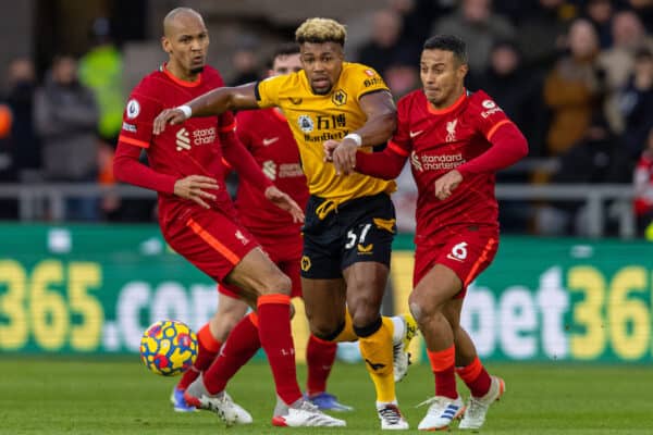 WOLVERHAMPTON, ENGLAND - Saturday, December 4, 2021: Wolverhampton Wanderers' Adama Traoré (C) gets away from Liverpool's Fabio Henrique Tavares 'Fabinho' (L) and Thiago Alcantara during the FA Premier League match between Wolverhampton Wanderers FC and Liverpool FC at Molineux Stadium. (Pic by David Rawcliffe/Propaganda)