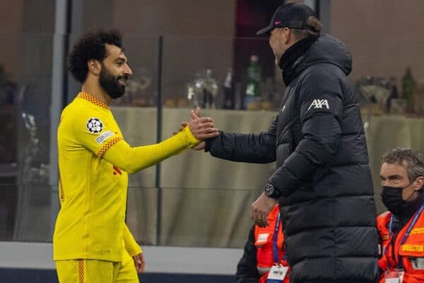 MILAN, ITALY - Tuesday, December 7, 2021: Liverpool's Mohamed Salah shakes hands with manager Jürgen Klopp as he is substituted during the UEFA Champions League Group B Matchday 6 game between AC Milan and Liverpool FC at the Stadio San Siro. (Pic by David Rawcliffe/Propaganda)