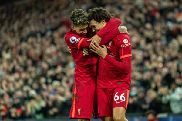 LIVERPOOL, ENGLAND - Thursday, December 16, 2021: Liverpool's Trent Alexander-Arnold (R) celebrates with team-mate Roberto Firmino after scoring the third goal during the FA Premier League match between Liverpool FC and Newcastle United FC at Anfield. (Pic by David Rawcliffe/Propaganda)