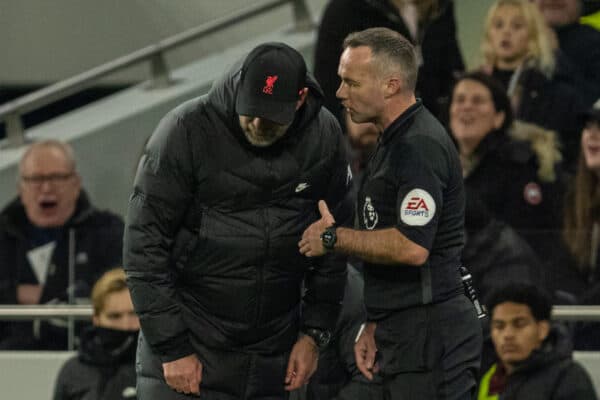 LONDON, ENGLAND - Sunday, December 19, 2021: Liverpool's manager Jürgen Klopp is spoken to by the referee during the FA Premier League match between Tottenham Hotspur FC and Liverpool FC at the Tottenham Hotspur Stadium. (Pic by David Rawcliffe/Propaganda)