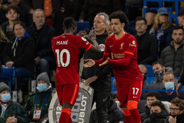 LONDON, ENGLAND - Sunday, January 2, 2022: Liverpool's Sadio Mané (L) is replaced by substitute Curtis Jones during the FA Premier League match between Chelsea FC and Liverpool FC at Stamford Bridge. (Pic by David Rawcliffe/Propaganda)