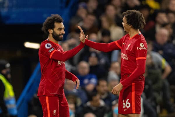 LONDON, ENGLAND - Sunday, January 2, 2022: Liverpool's Mohamed Salah celebrates with team-mate Trent Alexander-Arnold after scoring the second goal during the FA Premier League match between Chelsea FC and Liverpool FC at Stamford Bridge. (Pic by David Rawcliffe/Propaganda)