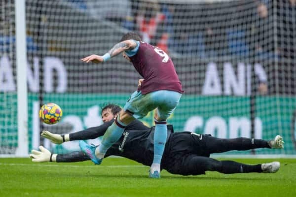 BURNLEY, ENGLAND - Sunday, February 13, 2022: Liverpool's goalkeeper Alisson Becker (L) and Burnley's Wout Weghorst during the FA Premier League match between Burnley FC and Liverpool FC at Turf Moor. (Pic by David Rawcliffe/Propaganda)