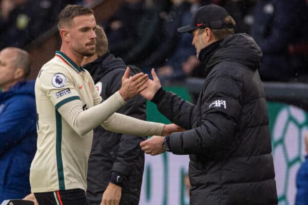 BURNLEY, ENGLAND - Sunday, February 13, 2022: Liverpool's captain Jordan Henderson shakes hands with manager Jürgen Klopp as he substituted during the FA Premier League match between Burnley FC and Liverpool FC at Turf Moor. (Pic by David Rawcliffe/Propaganda)