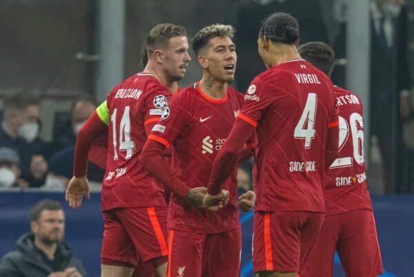 MILAN, ITALY - Tuesday, February 15, 2022: Liverpool's Roberto Firmino (L) celebrates with team-mate Virgil van Dijk after scoring the first goal during the UEFA Champions League Round of 16 1st Leg game between FC Internazionale Milano and Liverpool FC at the Stadio San Siro. (Pic by David Rawcliffe/Propaganda)