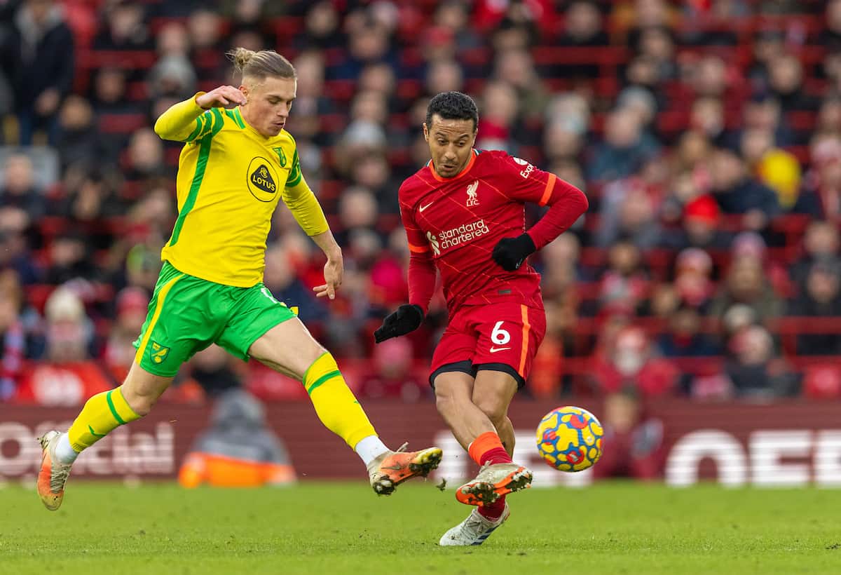 LIVERPOOL, ENGLAND - Saturday, February 19, 2022: Liverpool's Thiago Alcantara (R) is challenged by Norwich City's Przemys?aw P?acheta during the FA Premier League match between Liverpool FC and Norwich City FC at Anfield. (Pic by David Rawcliffe/Propaganda)