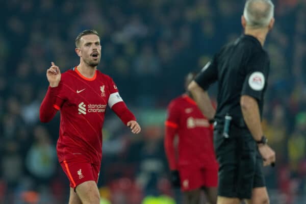 LIVERPOOL, ENGLAND - Wednesday, March 2, 2022: Liverpool's captain Jordan Henderson (L) speaks with referee Martin Atkinson during the FA Cup 5th Round match between Liverpool FC and Norwich City FC at Anfield. (Pic by David Rawcliffe/Propaganda)