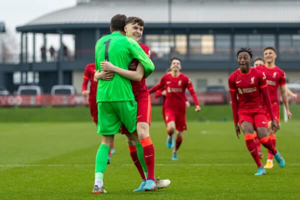 LIVERPOOL, ENGLAND - Wednesday, March 2, 2022: Liverpool's Bobby Clark (R) celebrates with team-mate goalkeeper Harvey Davies after scoring the winning penalty of the shoot-out after a 1-1 draw during the UEFA Youth League Round of 16 match between Liverpool FC Under 19's and KRC Genk Under 19's at the Liverpool Academy. (Pic by David Rawcliffe/Propaganda)