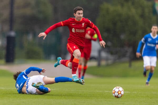 LIVERPOOL, ENGLAND - Wednesday, March 2, 2022: Liverpool's Mateusz Musialowski (R) skips over a challenge from KRC Genk's Jay-Dee Geusens during the UEFA Youth League Round of 16 match between Liverpool FC Under 19's and KRC Genk Under 19's at the Liverpool Academy. (Pic by David Rawcliffe/Propaganda)