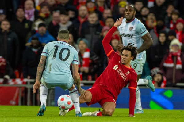 LIVERPOOL, ENGLAND - Friday, March 4, 2022: Liverpool's Trent Alexander-Arnold (R) challenges West Ham United's Manuel Lanzini during the FA Premier League match between Liverpool FC and West Ham United FC at Anfield. (Pic by David Rawcliffe/Propaganda)