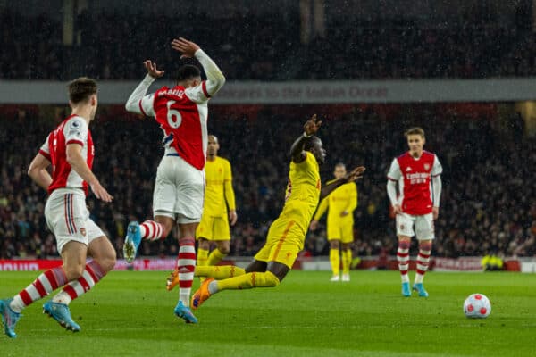 LONDON, ENGLAND - Wednesday, March 16, 2022: Liverpool's Sadio Mané is tripped by Arsenal's Gabriel dos Santos Magalhães during the FA Premier League match between Arsenal FC and Liverpool FC at the Emirates Stadium. (Pic by David Rawcliffe/Propaganda)