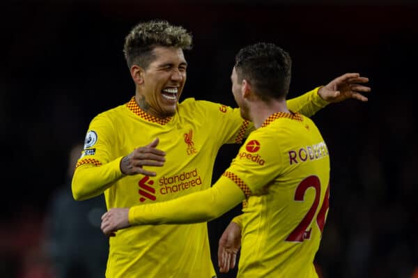 LONDON, ENGLAND - Wednesday, March 16, 2022: Liverpool's goal-scorer Roberto Firmino celebrates with team-mate Andy Robertson after the FA Premier League match between Arsenal FC and Liverpool FC at the Emirates Stadium. Liverpool won 2-0. (Pic by David Rawcliffe/Propaganda)