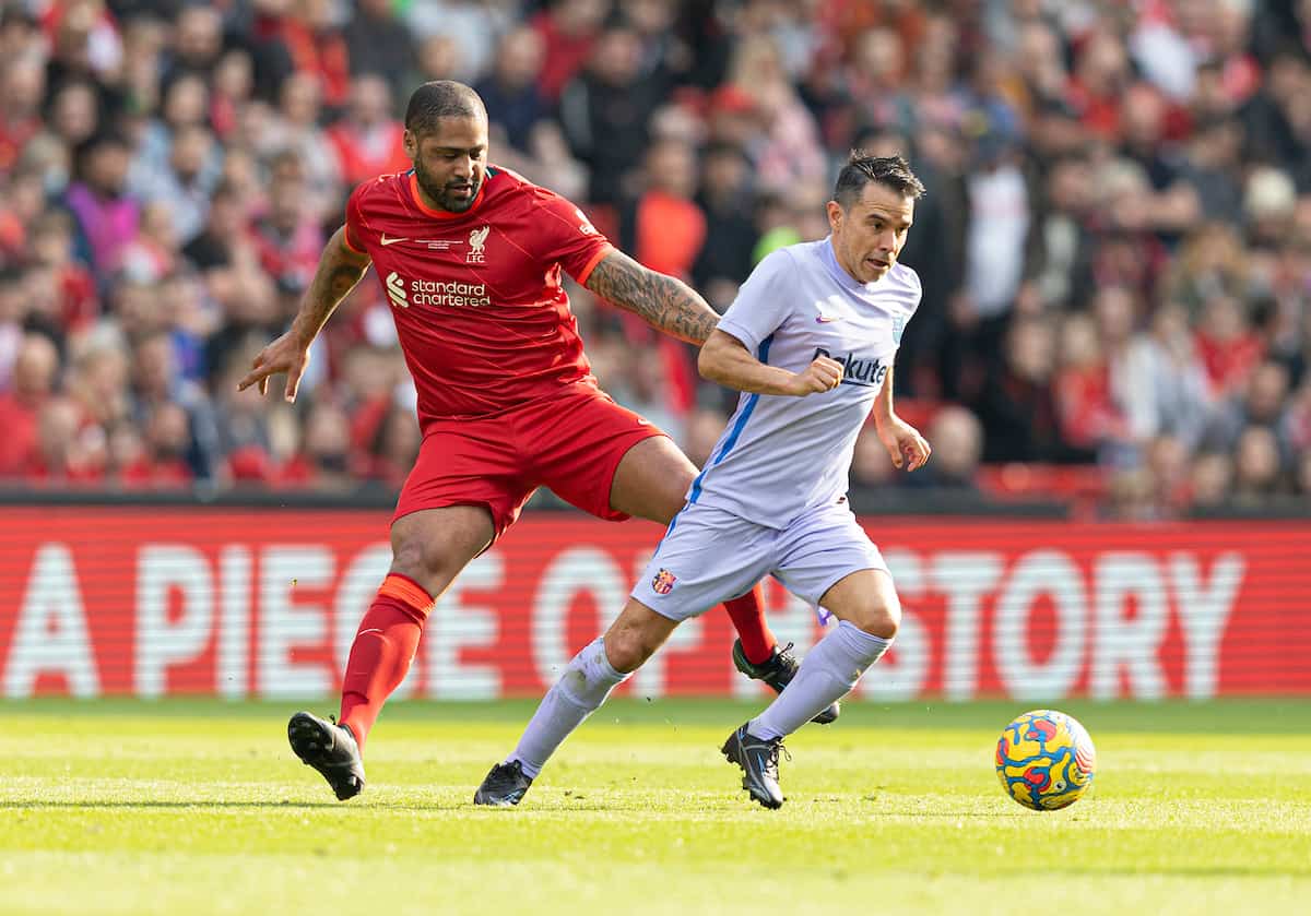 LIVERPOOL, ENGLAND - Saturday, March 26, 2022: Liverpool's Glen Johnson challenges Barcelona?s Javier Saviola during the LFC Foundation friendly match between Liverpool FC Legends and FC Barcelona Legends at Anfield. (Pic by Paul Currie/Propaganda)