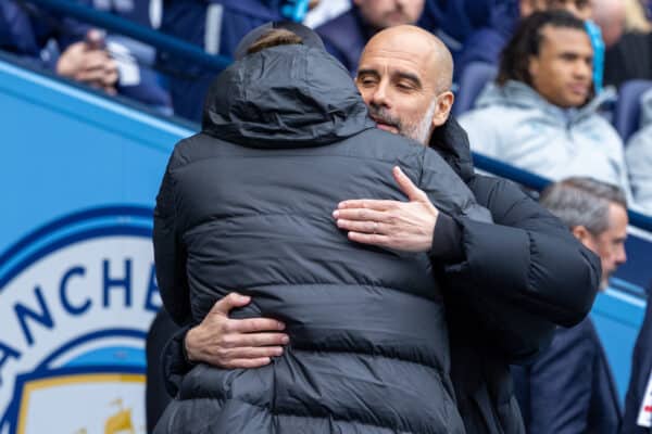 MANCHESTER, ENGLAND - Sunday, April 10, 2022: Manchester City's manager Josep 'Pep' Guardiola (R) embraces Liverpool's manager Jürgen Klopp before the FA Premier League match between Manchester City FC and Liverpool FC at the City of Manchester Stadium. (Pic by David Rawcliffe/Propaganda)