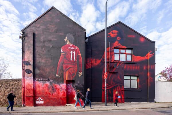 LIVERPOOL, ENGLAND - Wednesday, April 13, 2022: Supporters walk past a mural of Liverpool's Mohamed Salah before the UEFA Champions League Quarter-Final 2nd Leg game between Liverpool FC and SL Benfica at Anfield. (Pic by David Rawcliffe/Propaganda)