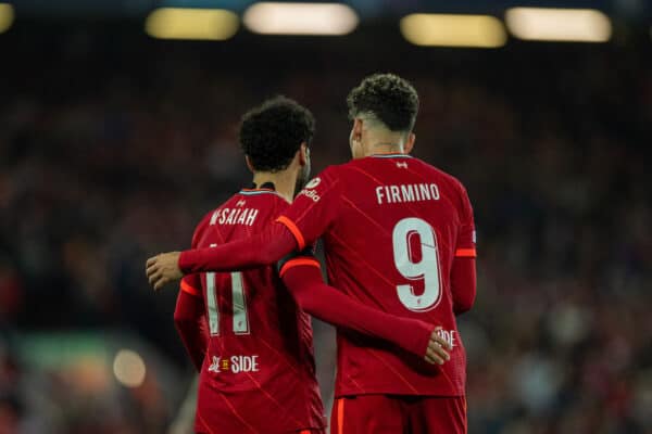 LIVERPOOL, ENGLAND - Wednesday, April 13, 2022: Liverpool's Roberto Firmino (R) celebrates with team-mate Mohamed Salah after scoring the third goal during the UEFA Champions League Quarter-Final 2nd Leg game between Liverpool FC and SL Benfica at Anfield. (Pic by David Rawcliffe/Propaganda)