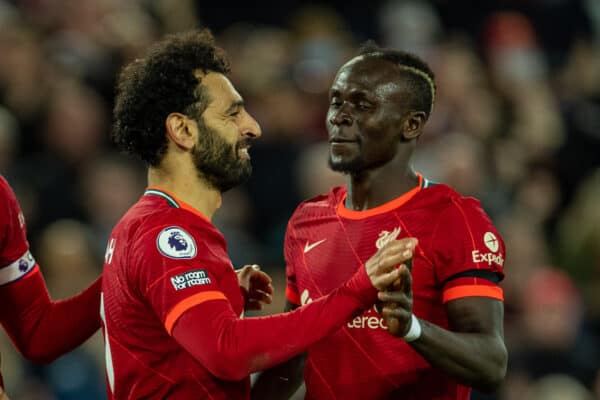 LIVERPOOL, ENGLAND - Tuesday, April 19, 2022: Liverpool's Mohamed Salah celebrates with team-mate Sadio Mané after scoring the fourth goal during the FA Premier League match between Liverpool FC and Manchester United FC at Anfield. (Pic by David Rawcliffe/Propaganda)