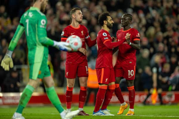 LIVERPOOL, ENGLAND - Tuesday, April 19, 2022: Liverpool's Mohamed Salah celebrates with team-mate Sadio Mané after scoring the fourth goal during the FA Premier League match between Liverpool FC and Manchester United FC at Anfield. (Pic by David Rawcliffe/Propaganda)