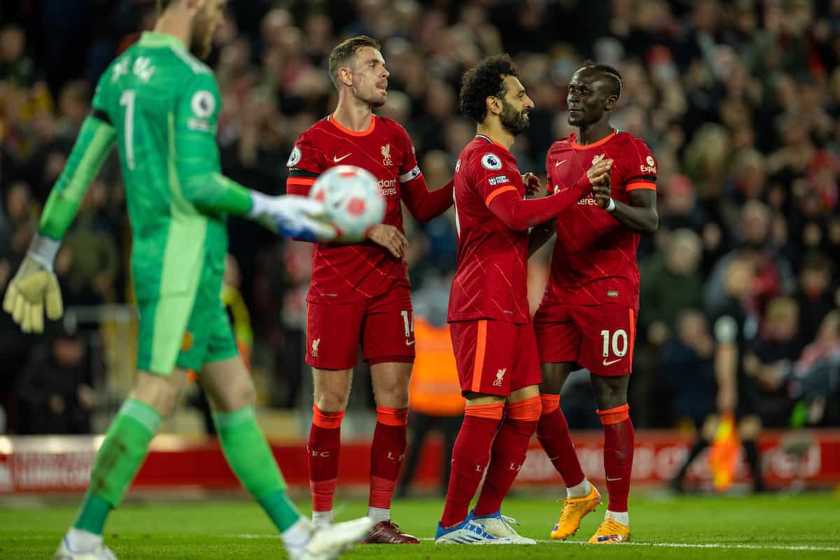LIVERPOOL, ENGLAND - Tuesday, April 19, 2022: Liverpool's Mohamed Salah celebrates with team-mate Sadio Mané after scoring the fourth goal during the FA Premier League match between Liverpool FC and Manchester United FC at Anfield. (Pic by David Rawcliffe/Propaganda)