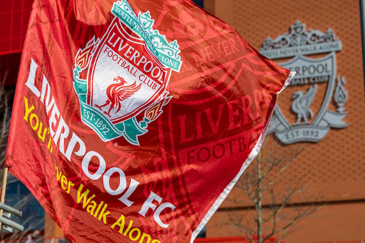 LIVERPOOL, ENGLAND - Tuesday, April 19, 2022: Liverpool flags on sale outside the new Main Stand pictured before the FA Premier League match between Liverpool FC and Manchester United FC at Anfield. (Pic by David Rawcliffe/Propaganda)