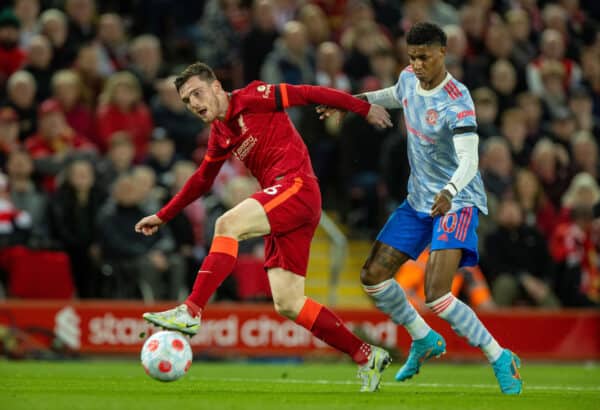 LIVERPOOL, ENGLAND - Tuesday, April 19, 2022: Liverpool's Andy Robertson (L) and Manchester United's Marcus Rashford during the FA Premier League match between Liverpool FC and Manchester United FC at Anfield. (Pic by David Rawcliffe/Propaganda)