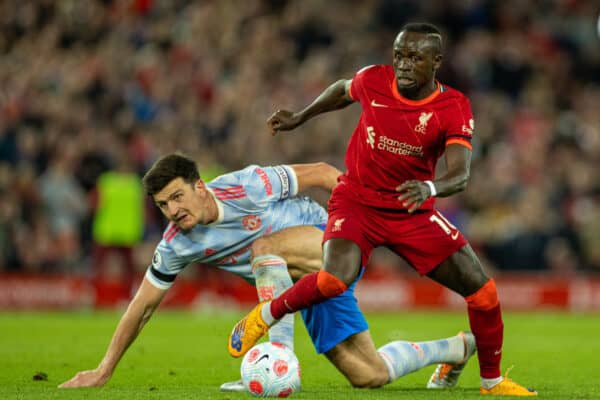 LIVERPOOL, ENGLAND - Tuesday, April 19, 2022: Liverpool's Sadio Mané and Manchester United's captain Harry Maguire during the FA Premier League match between Liverpool FC and Manchester United FC at Anfield. (Pic by David Rawcliffe/Propaganda)